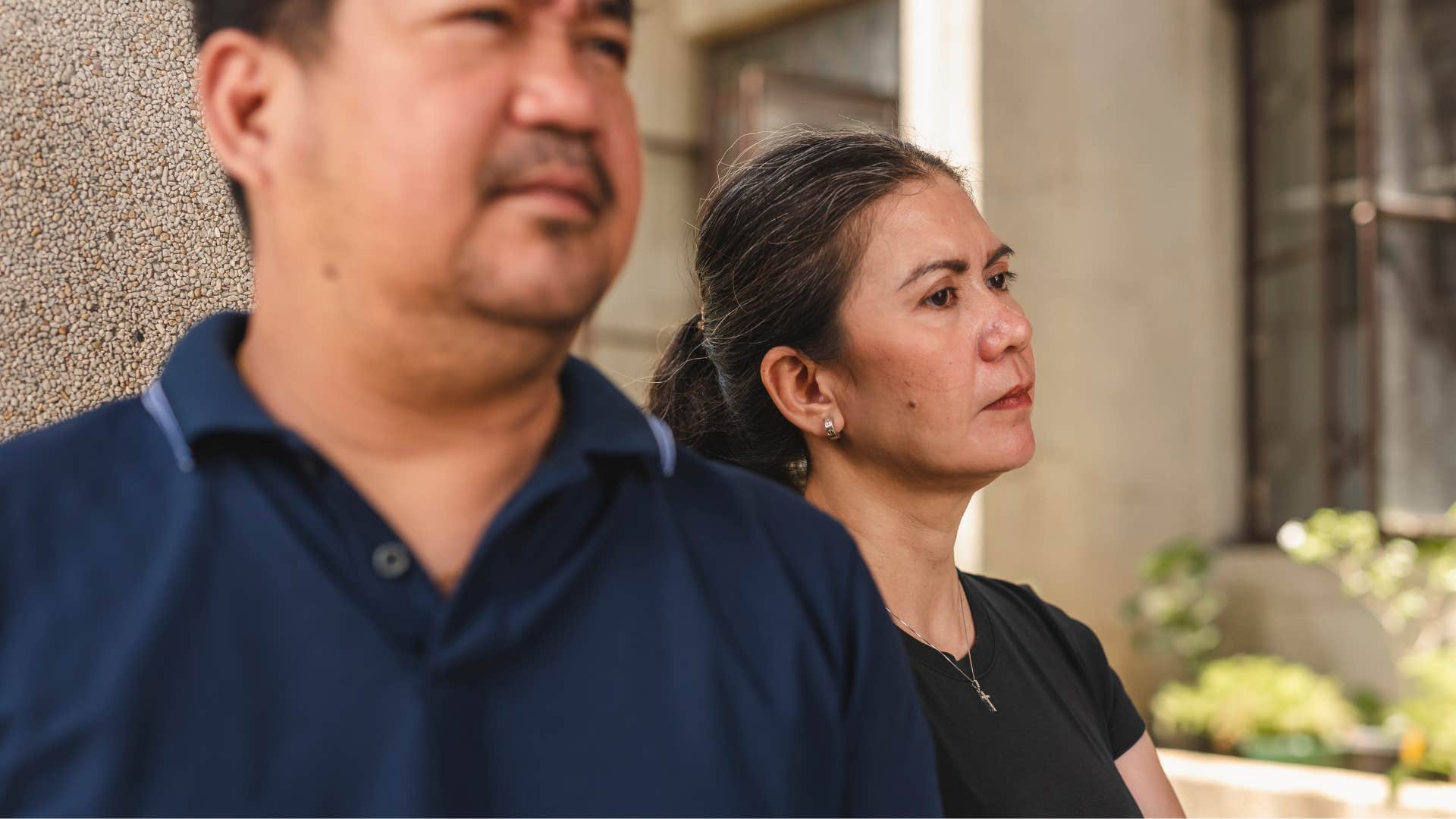 woman telling husband shes staying home