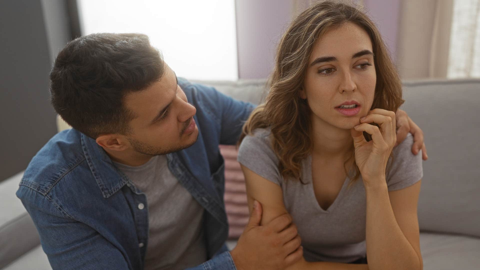 woman saying that's not right to her concerned husband