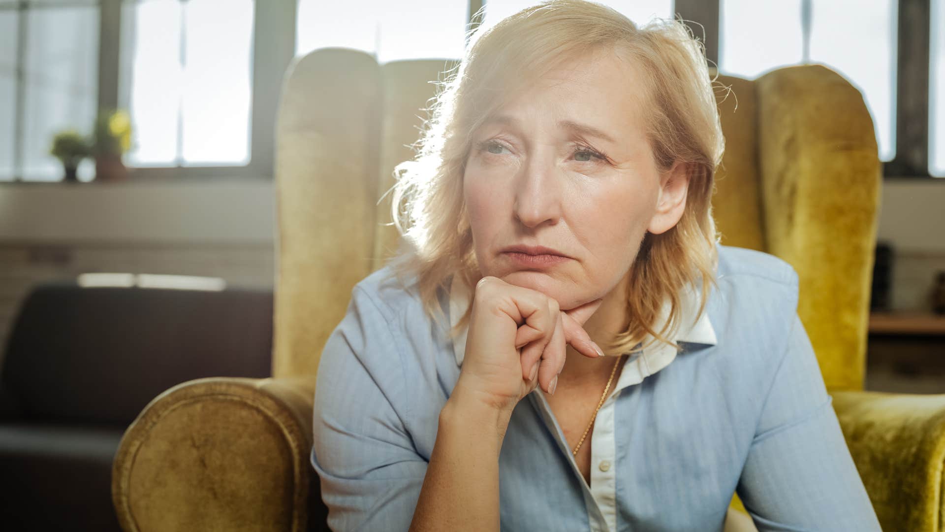 upset woman frustrated with husband telling herself I don't even know why I bother explaining it