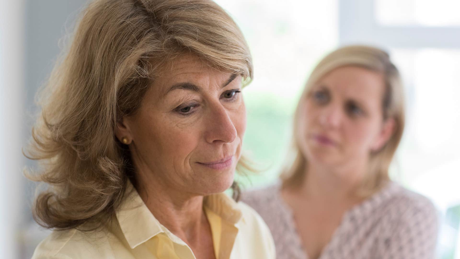 older woman saying i'm not here to entertain you to friend