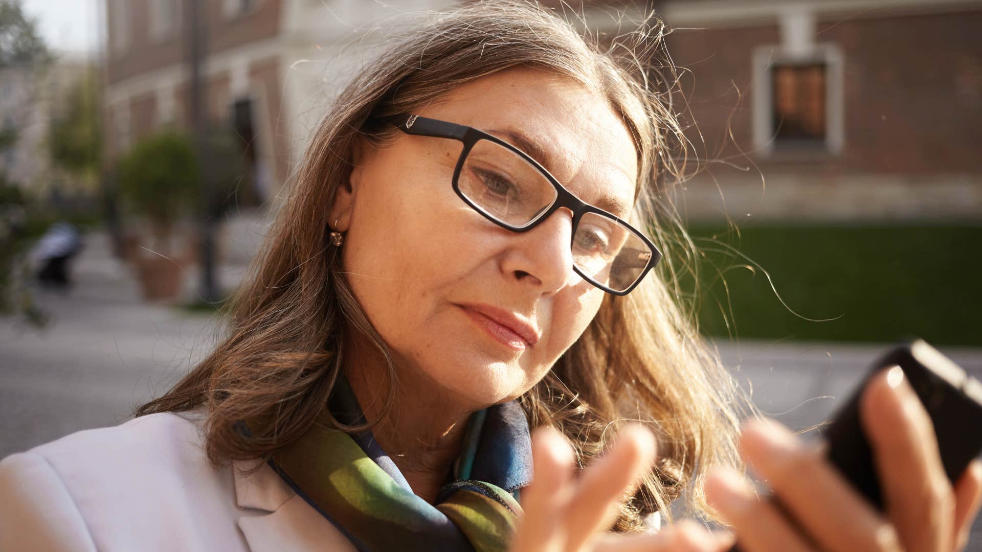 woman saying I'm not here to impress anyone on her phone