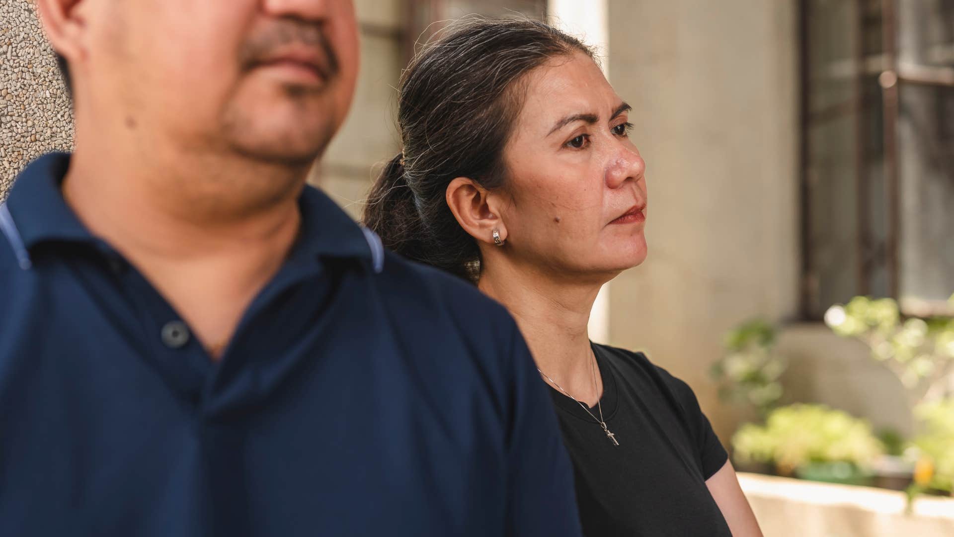 irritated older woman telling man I won't explain myself twice