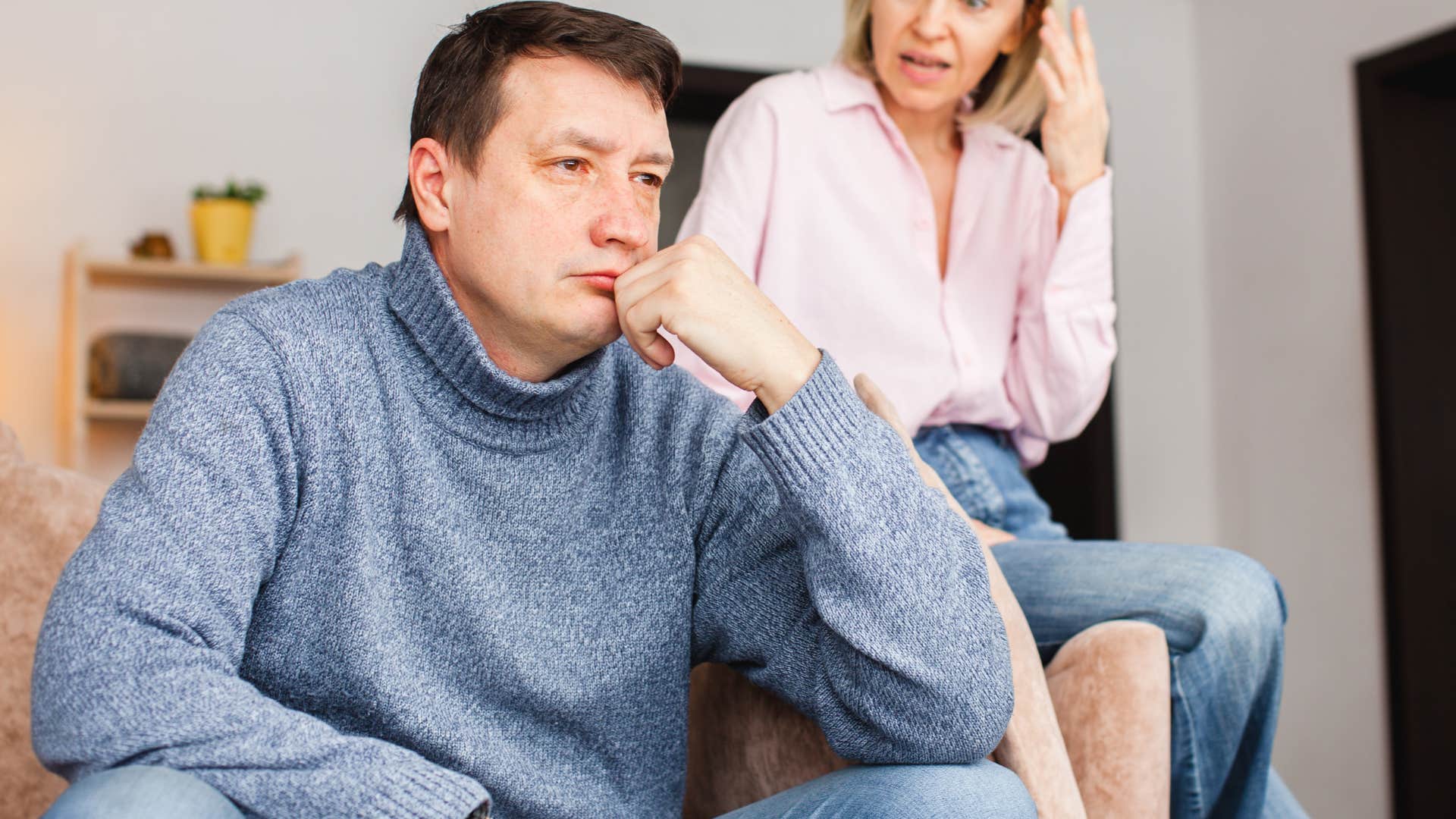 woman berating husband asking if he can wear something else