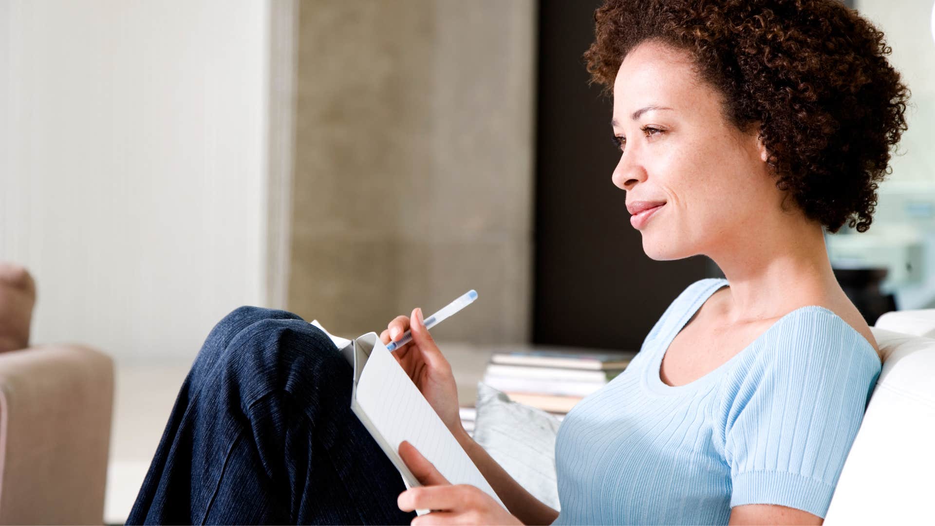 woman knowing the trick of putting pen to paper to shut down manipulative parent