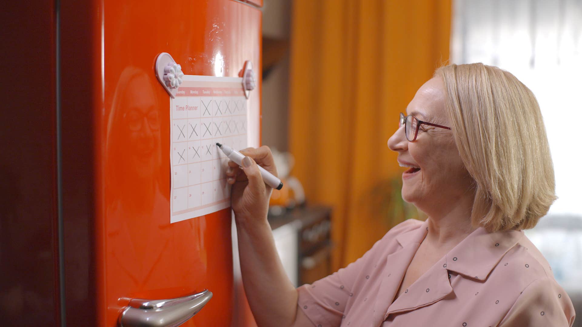 lonely parents has calendars around his house
