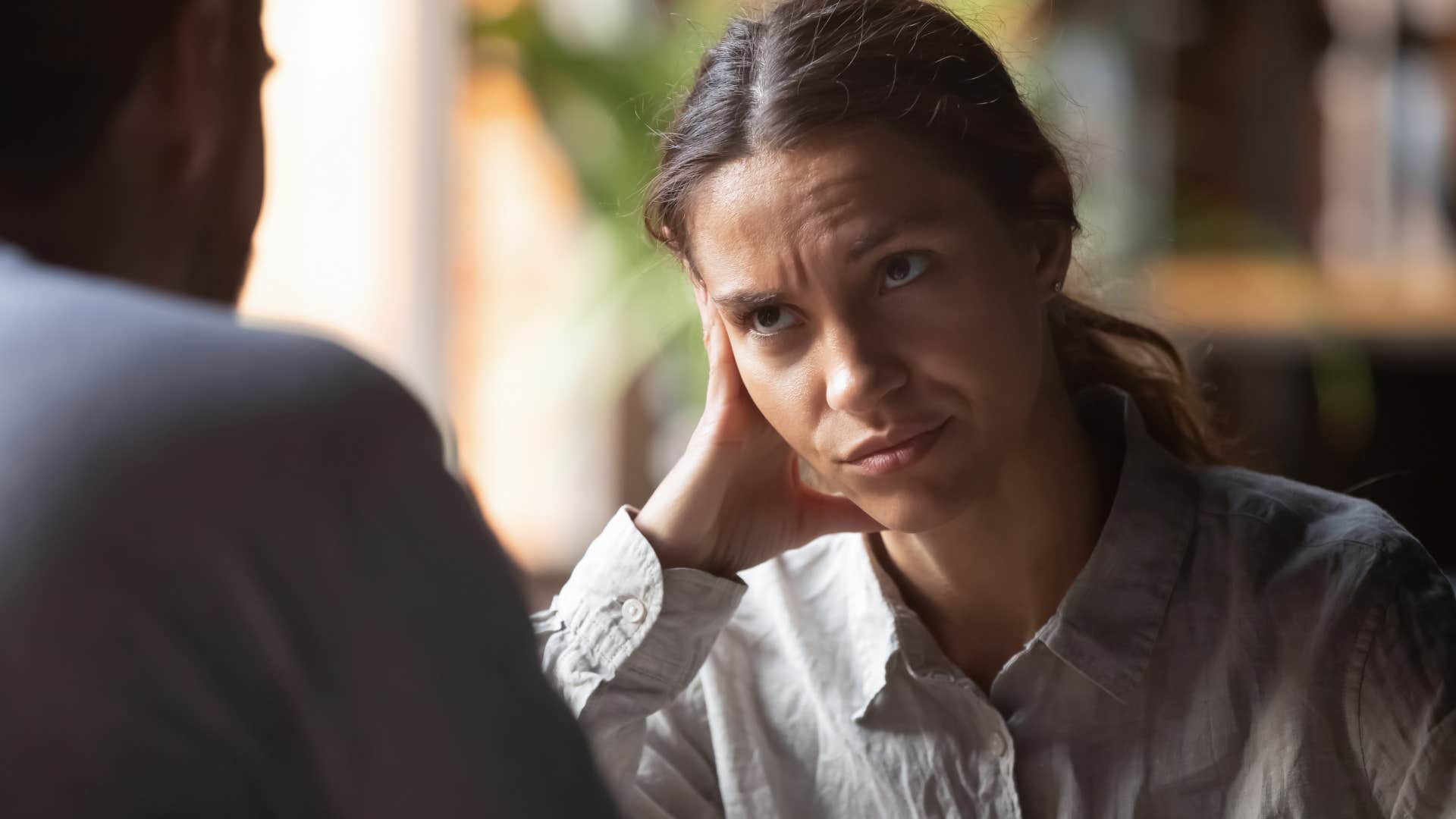 tired woman saying don't judge I'm so exhausted to a friend