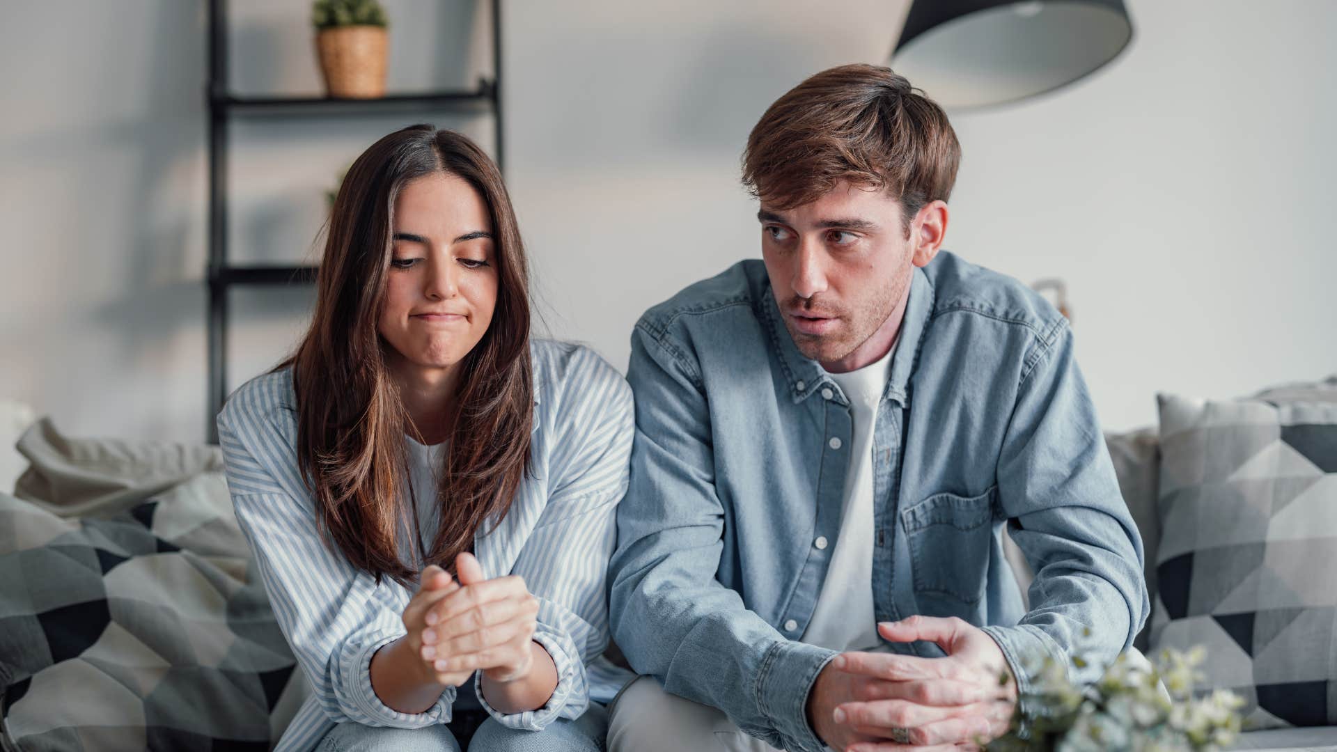 young couple not talking about money