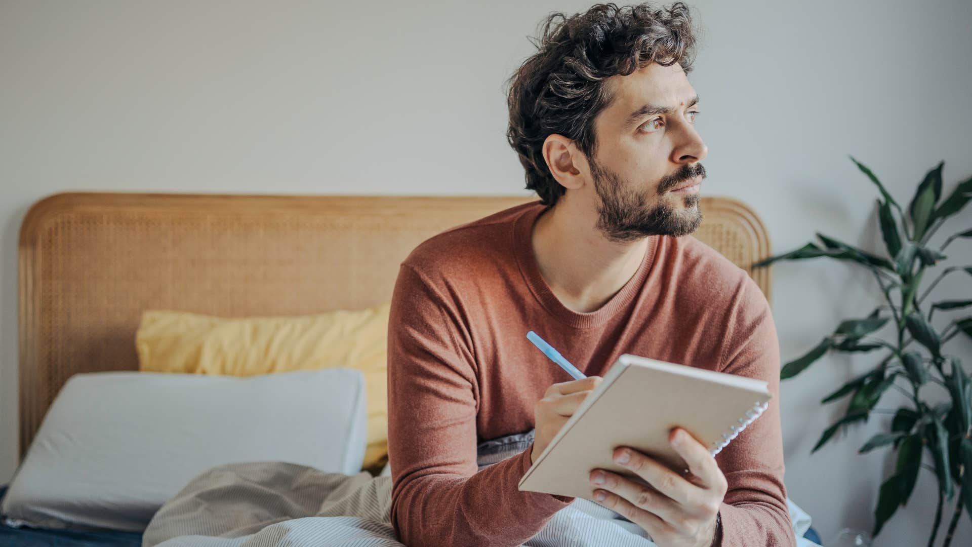 man making handwritten notes