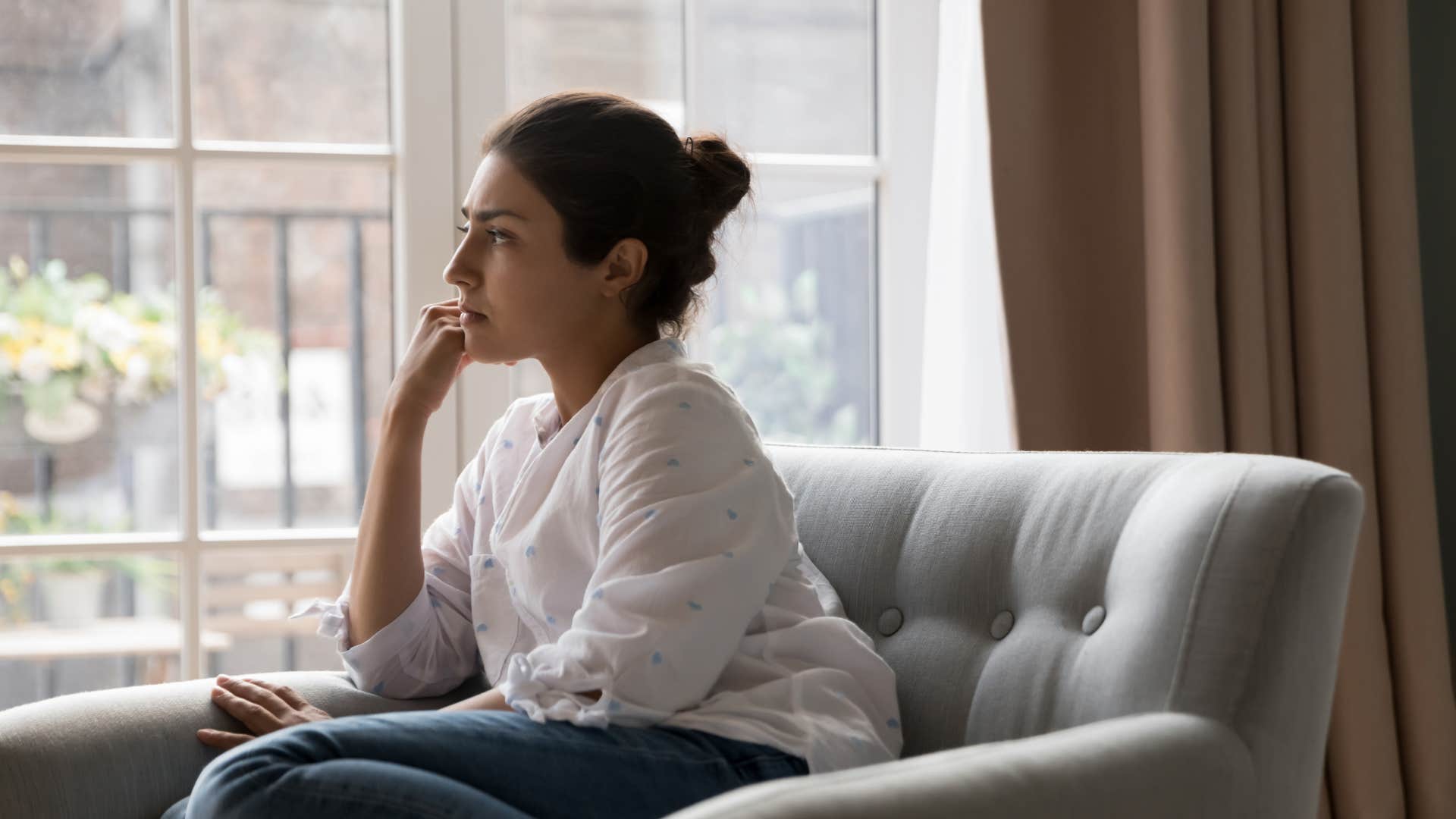 woman who is more relaxed than everyone else as she understands emotions are fleeting