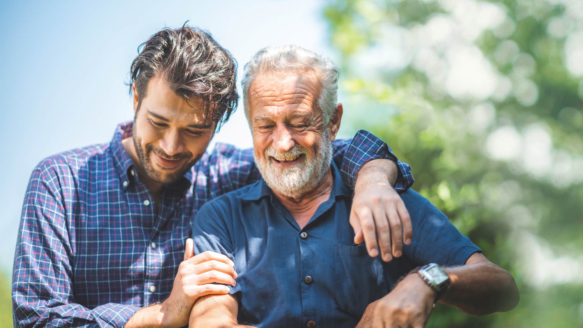 man hugging his father and asking questions that matter