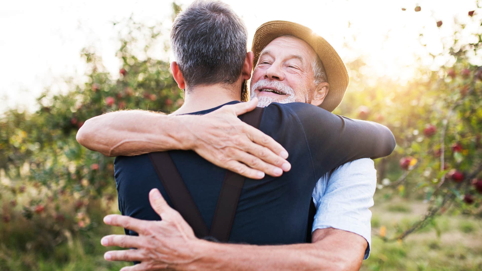 man saying thank you to his dad while hugging