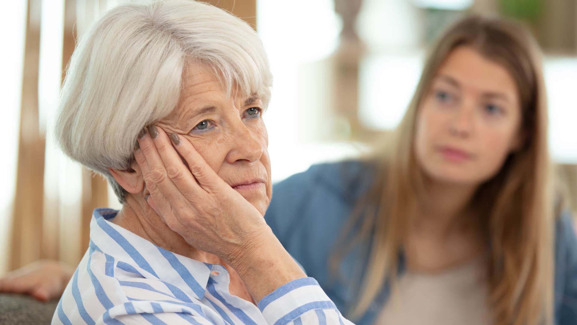 woman avoiding family drama next to her daughter