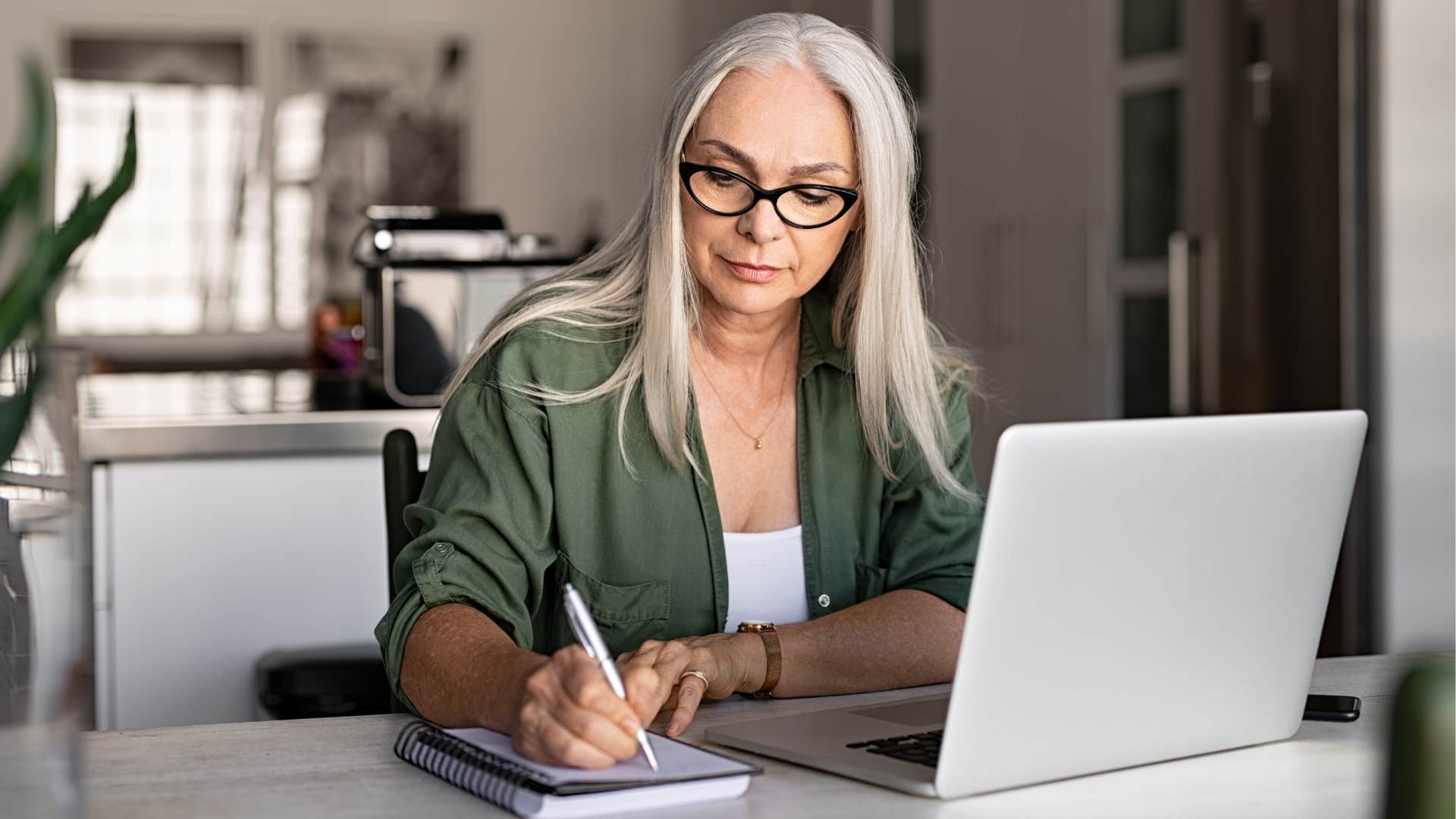 woman writing about mental health strategies
