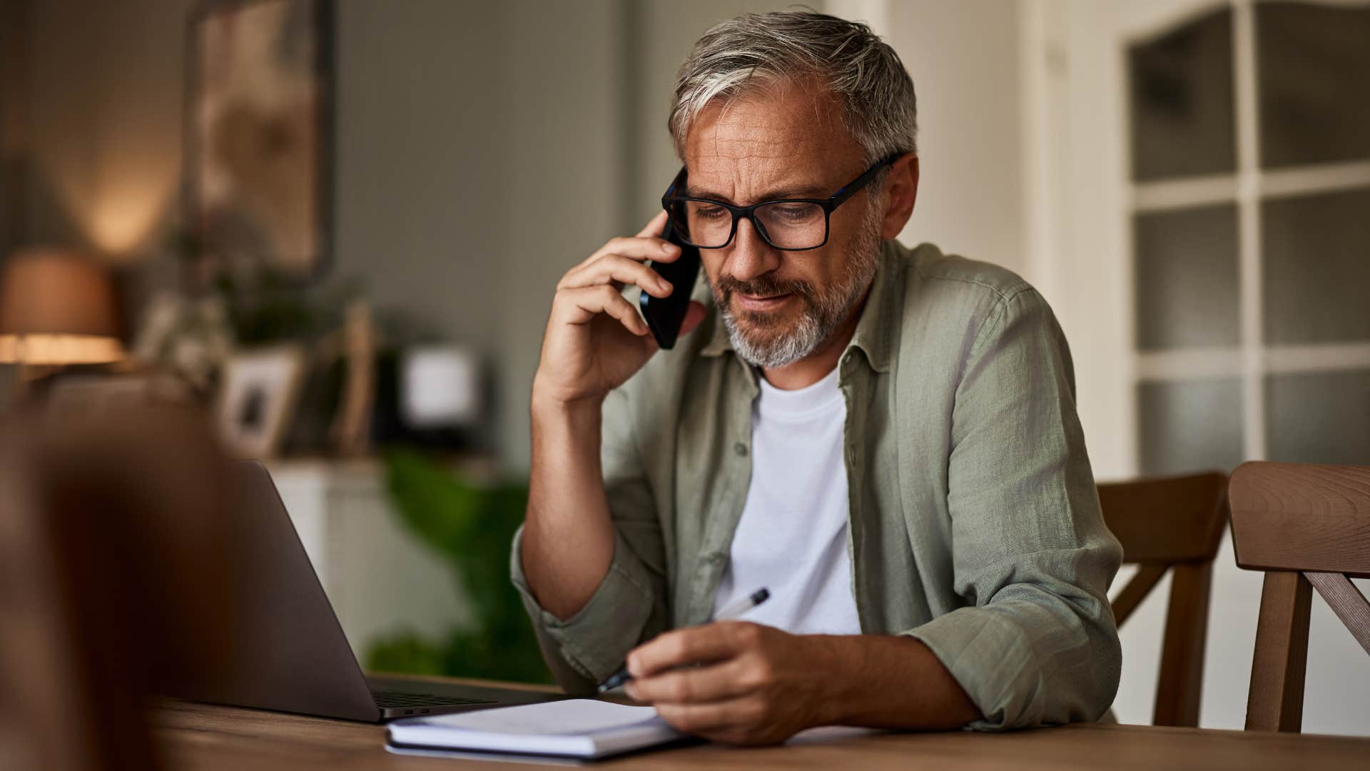 man talking about his next move on the phone