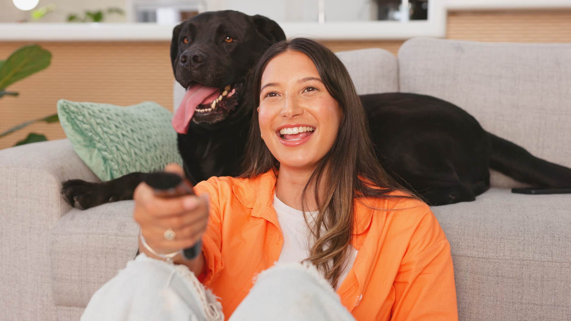 woman talking to her pet at home