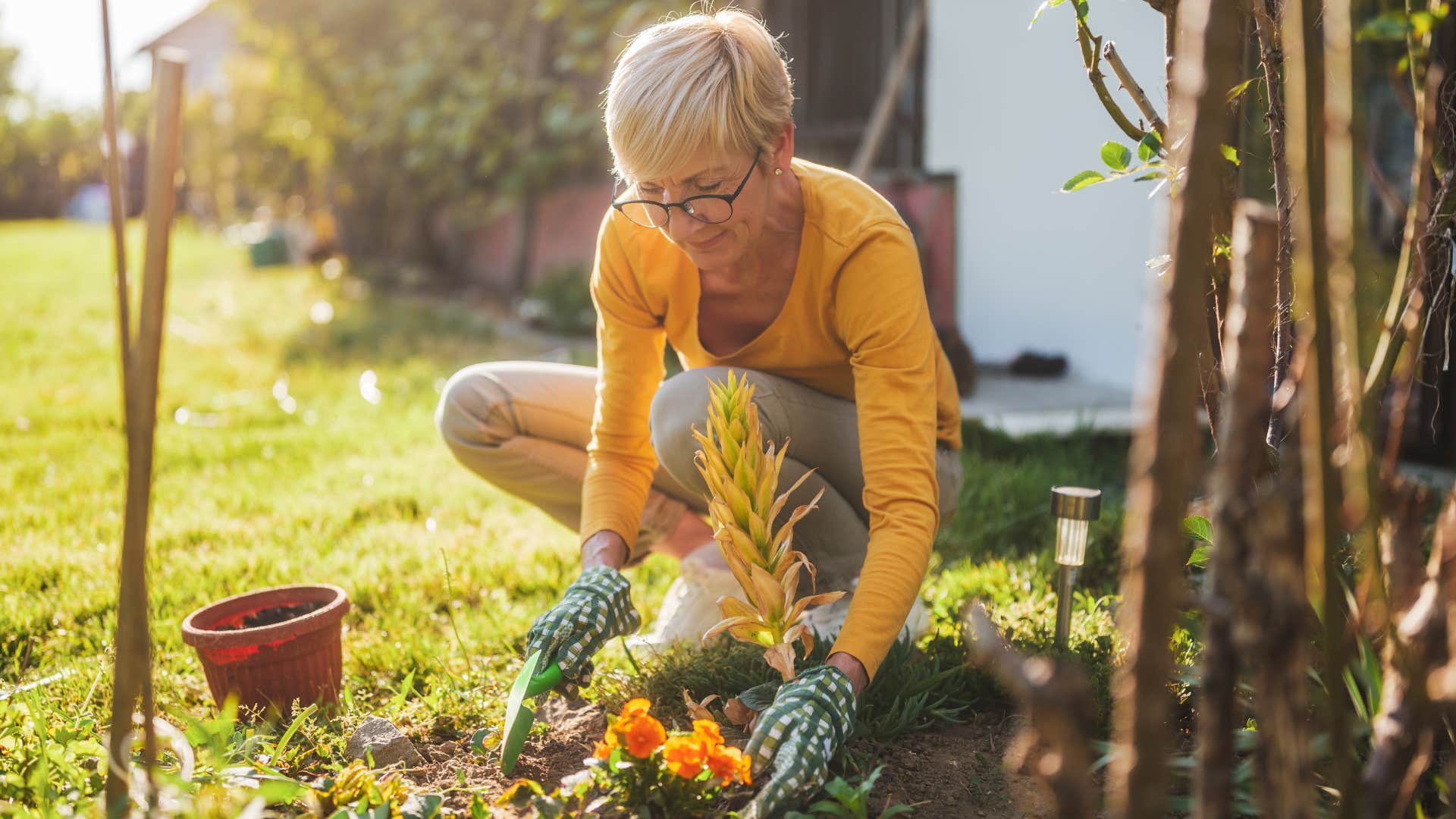 woman tending to garden