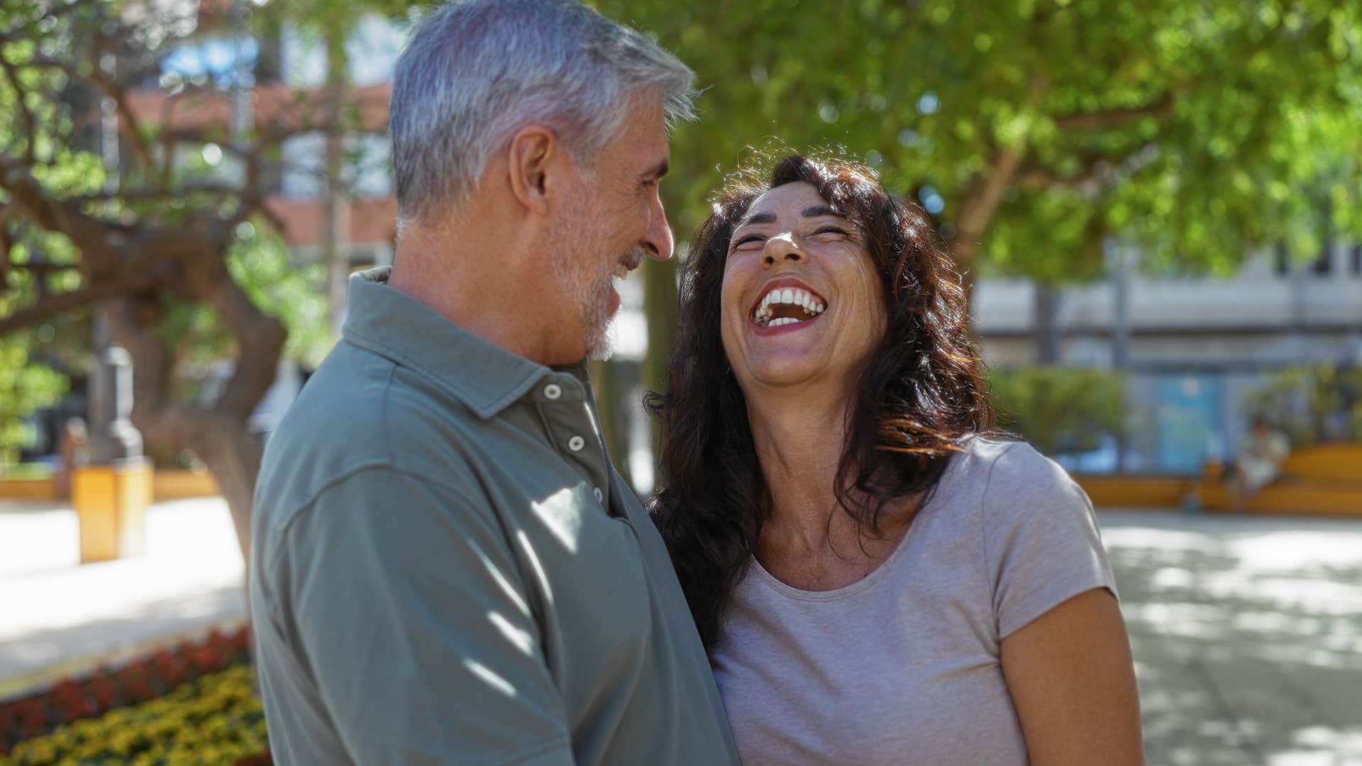 man laughing with woman because he made a mistake