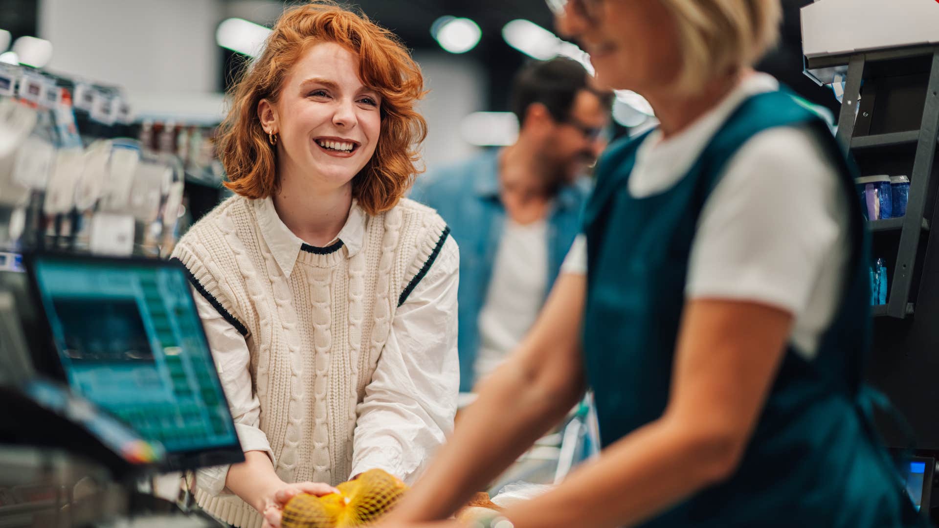 woman letting people skip in line at the grocery store