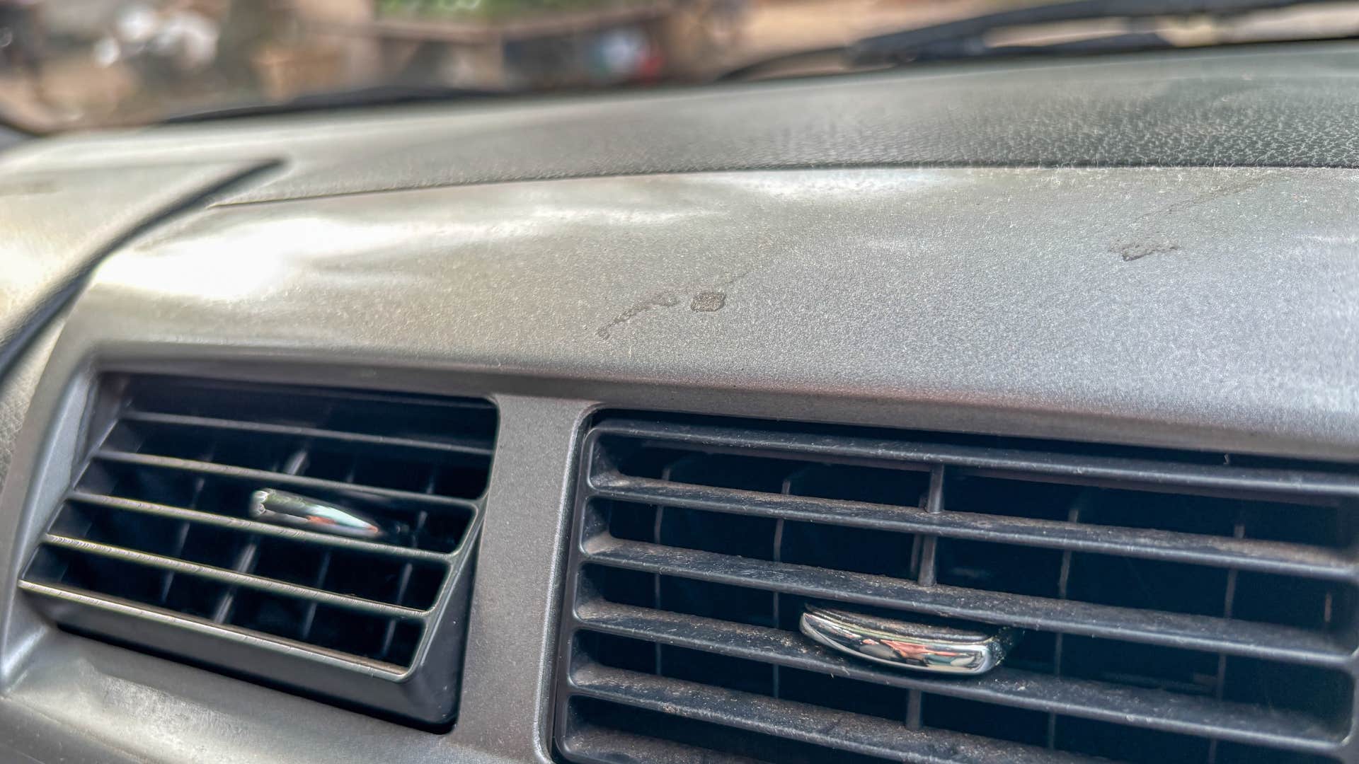 if you see these things in a man’s car he’s mentally checked out of life dusty dashboard