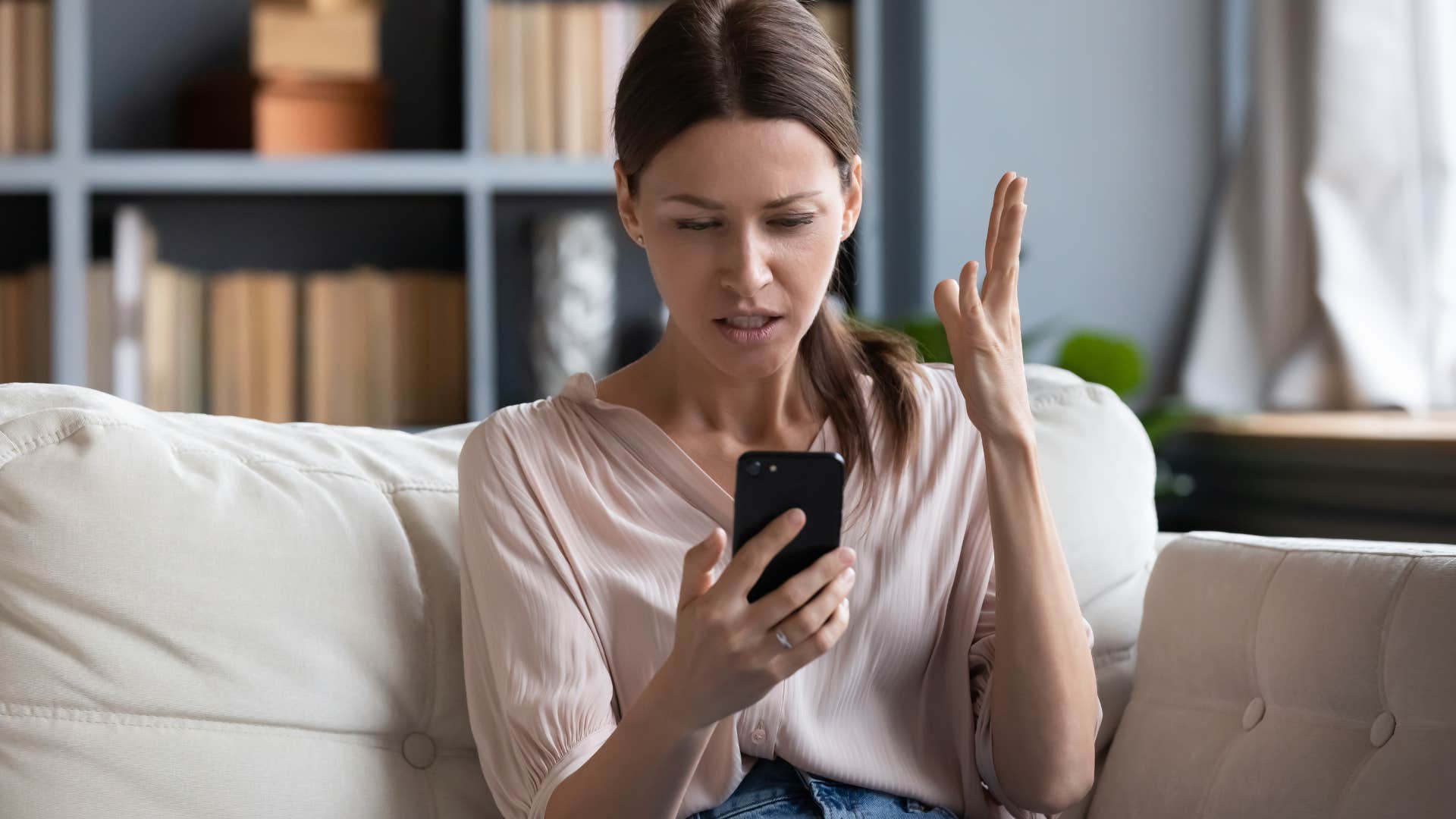 woman annoyed at friend taking forever to read her text