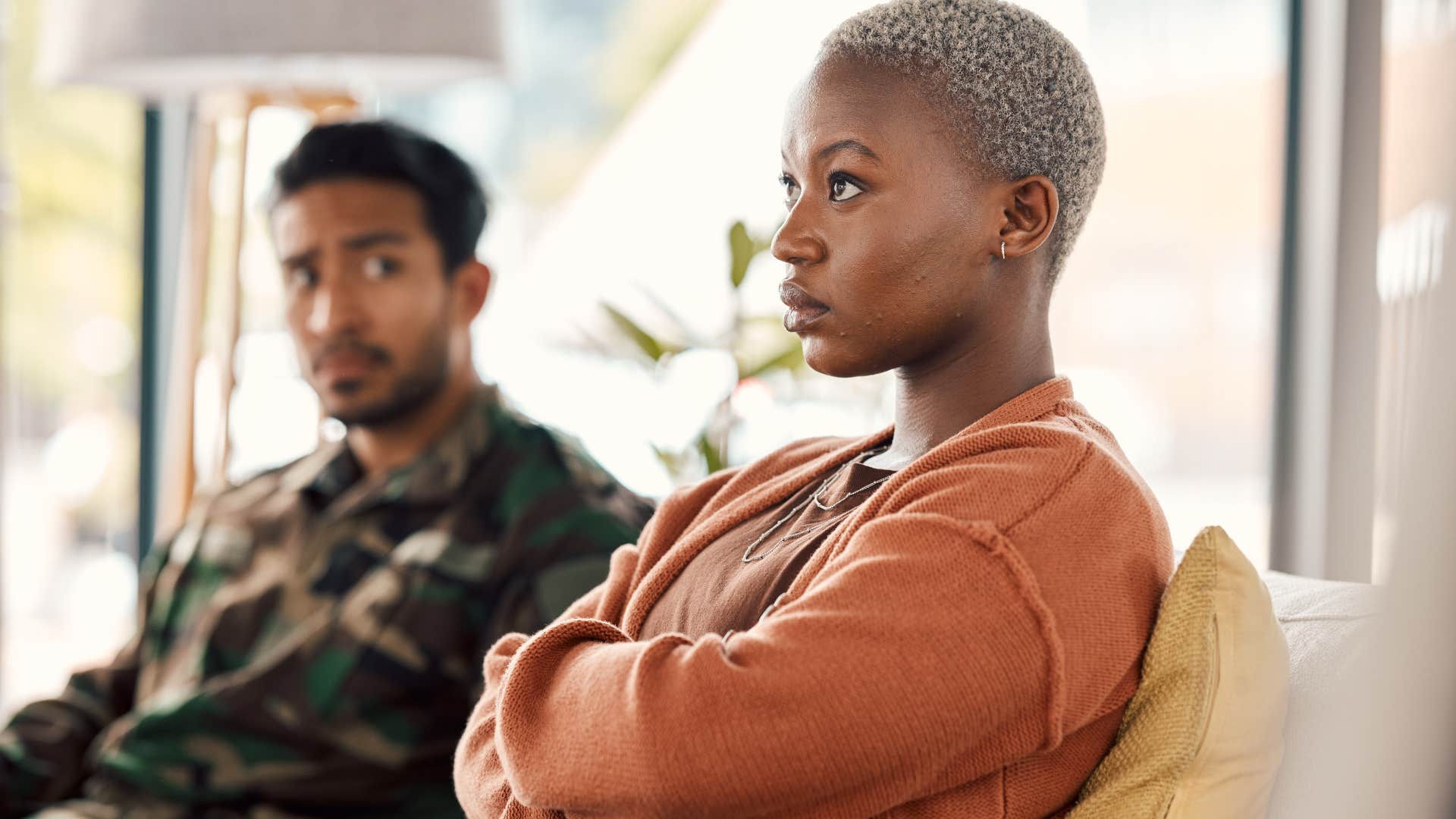 Woman turned away from her husband not saying "I love you" first.