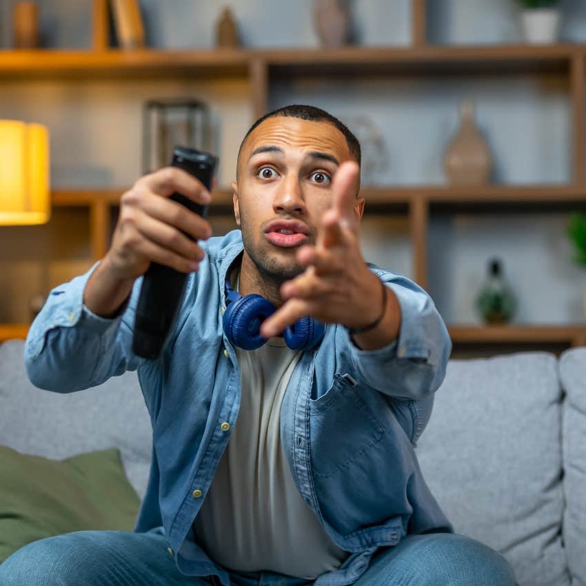 man who is very anxious watching the news