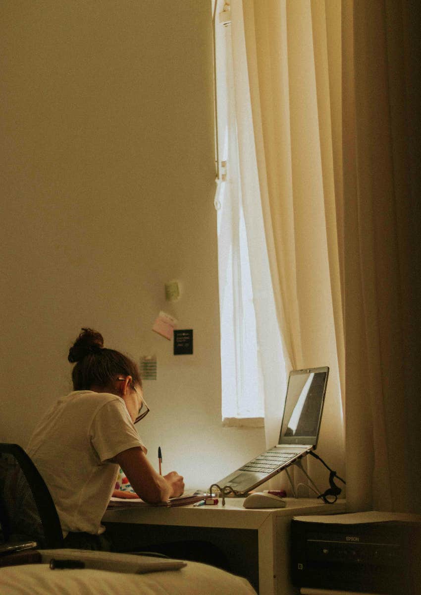 high school student writing an essay with AI