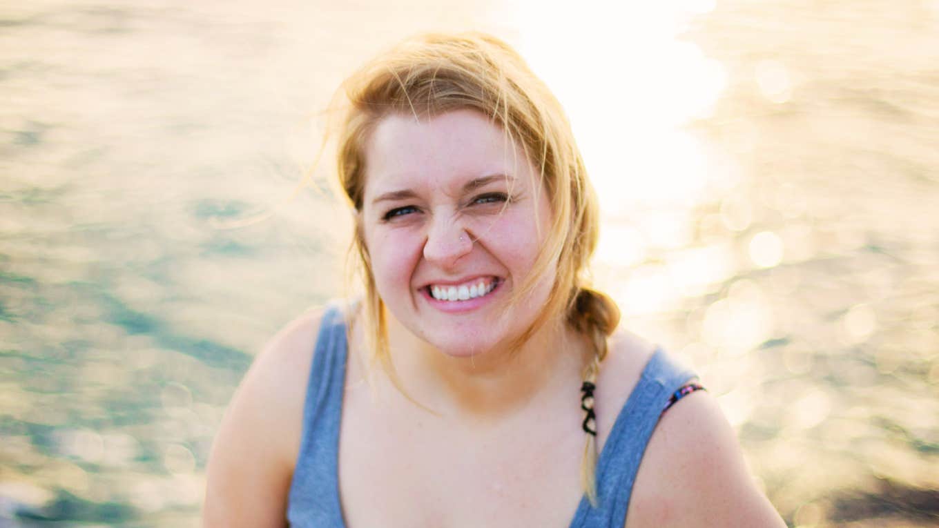 Woman letting go of control and embrcing positivity. 