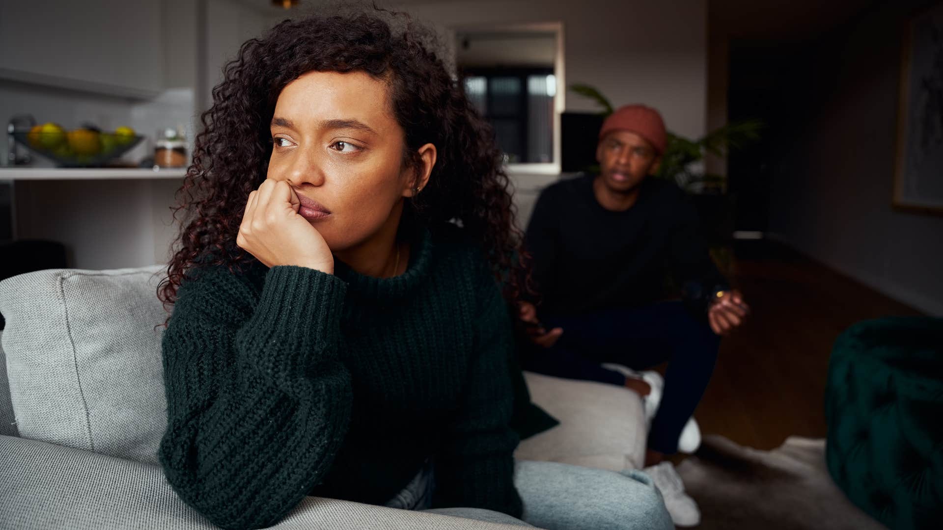 woman not showing affection turned away from husband