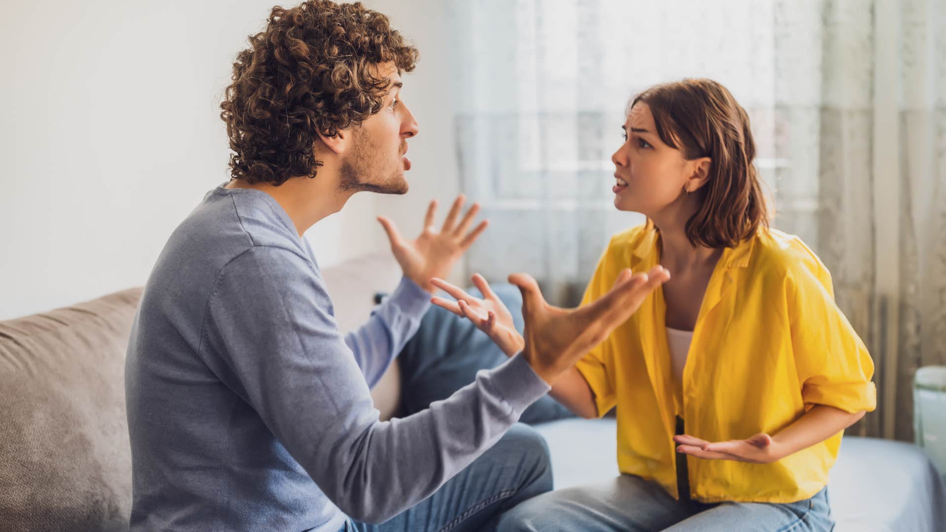 woman yelling at husband criticizing him