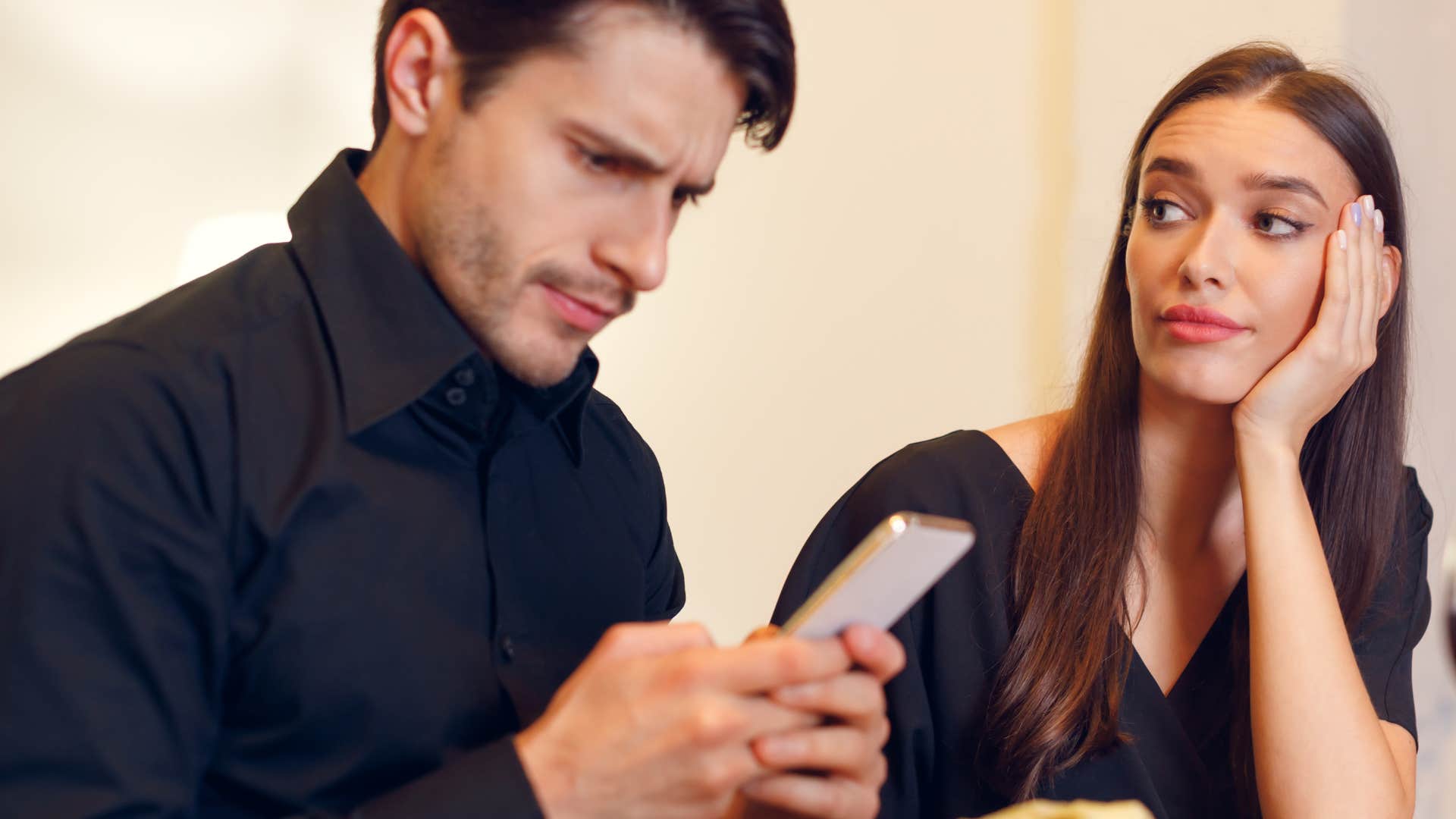 man who is cheating spending more time on his phone