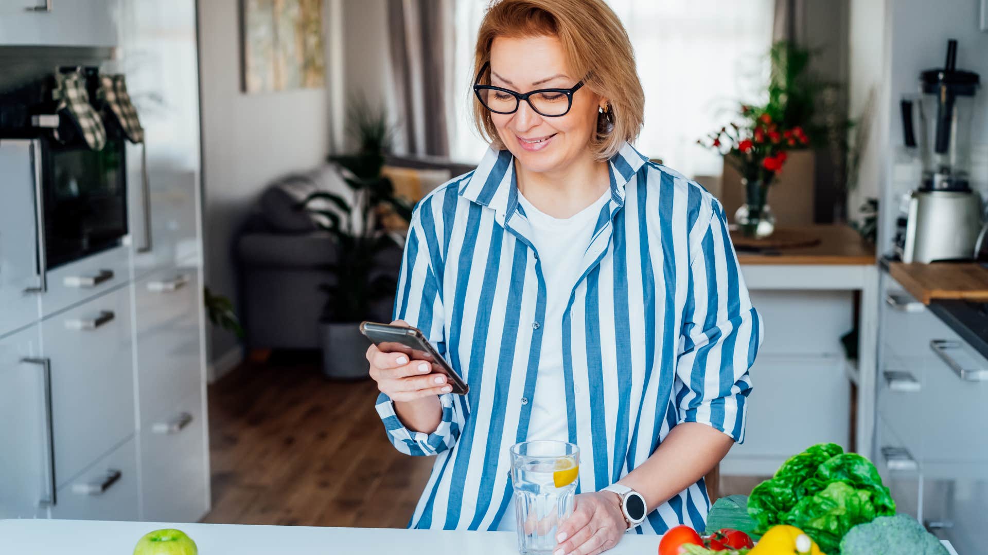 woman meal planning on phone