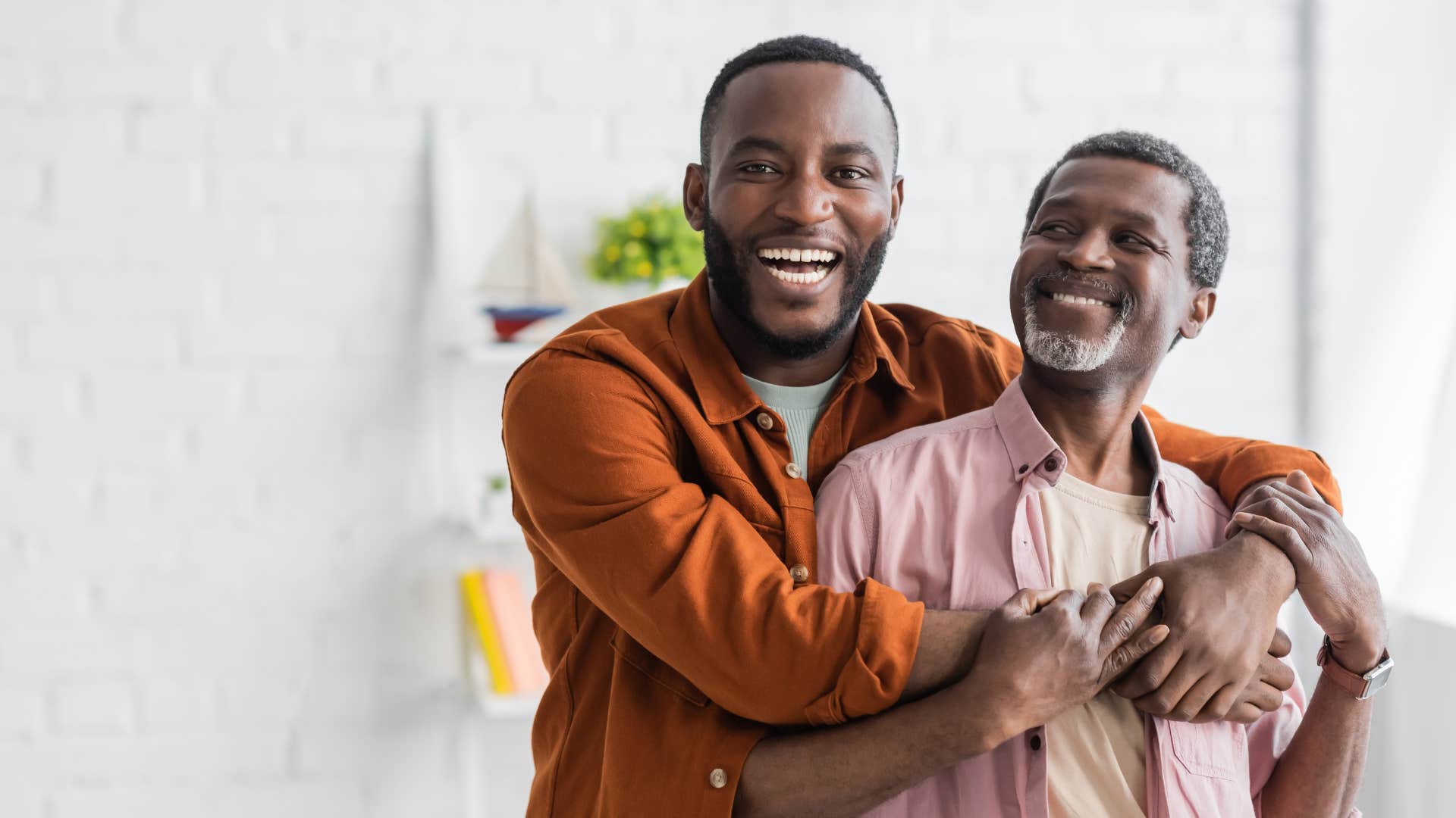 adult man hugging his dad