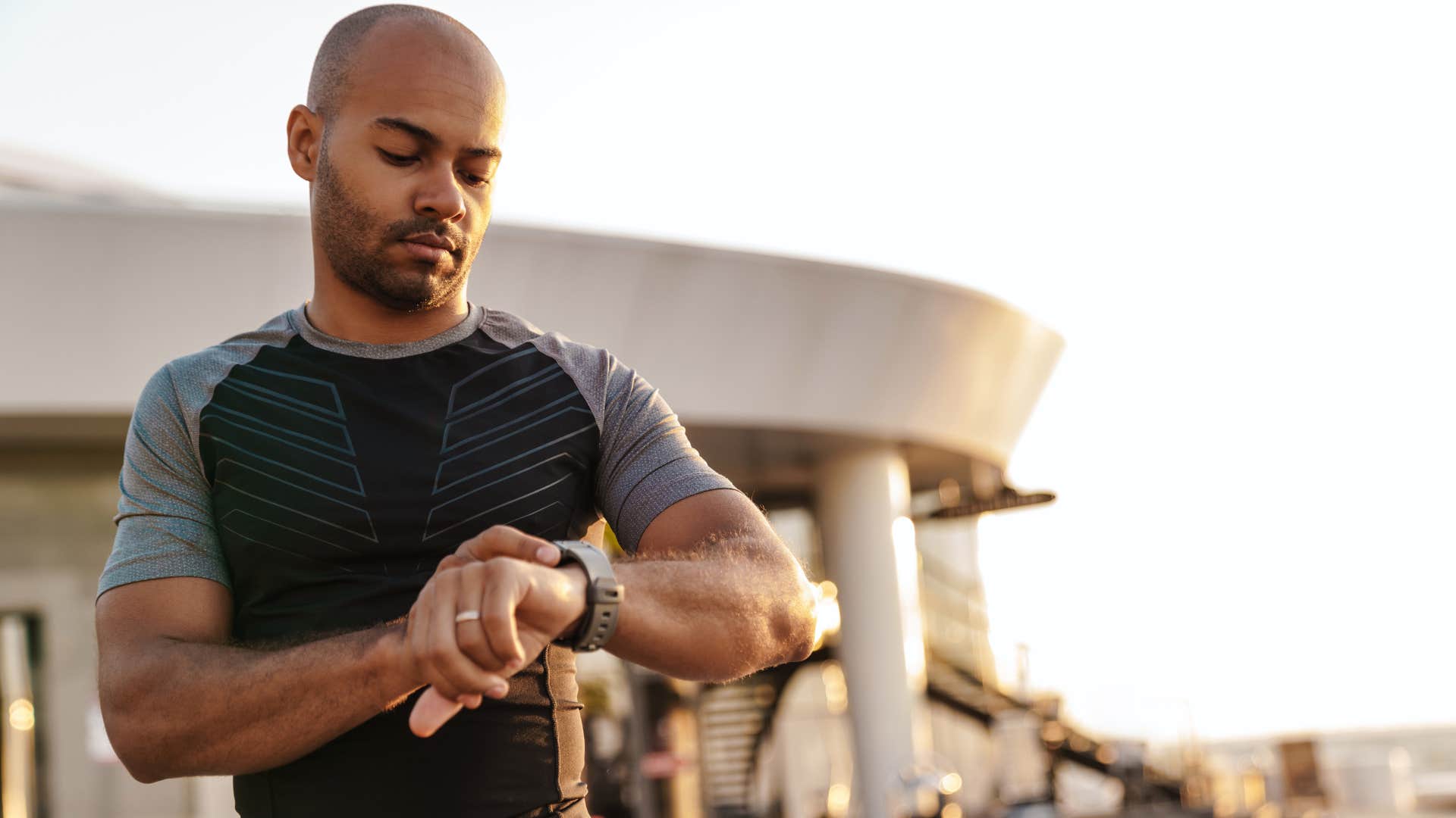 man looking at watch