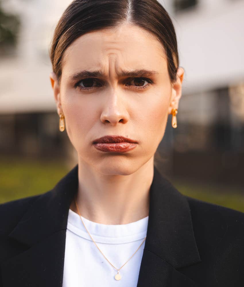 Ponytail woman's head hurts