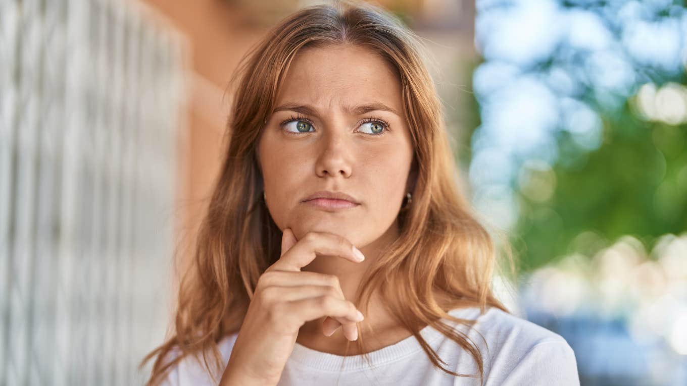 pensive woman feeling distrustful of others
