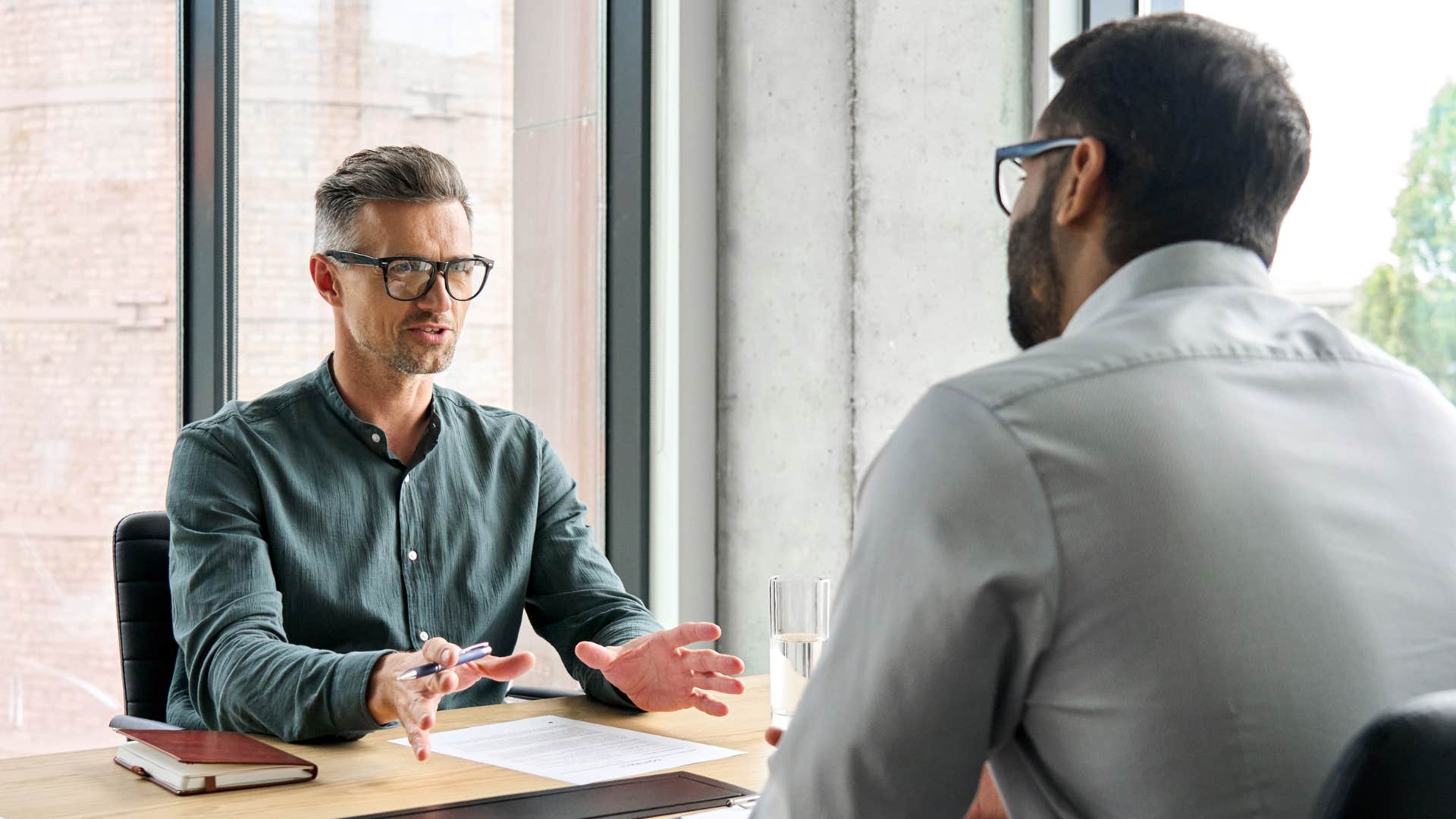 man using disclaimers as he talks to co-worker