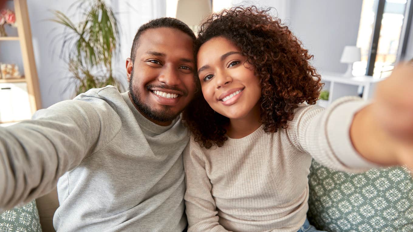 happy couple ready for marriage taking a selfie together