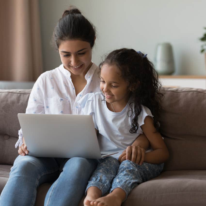 man who is raising child with a strong conscience by showing uplifting videos
