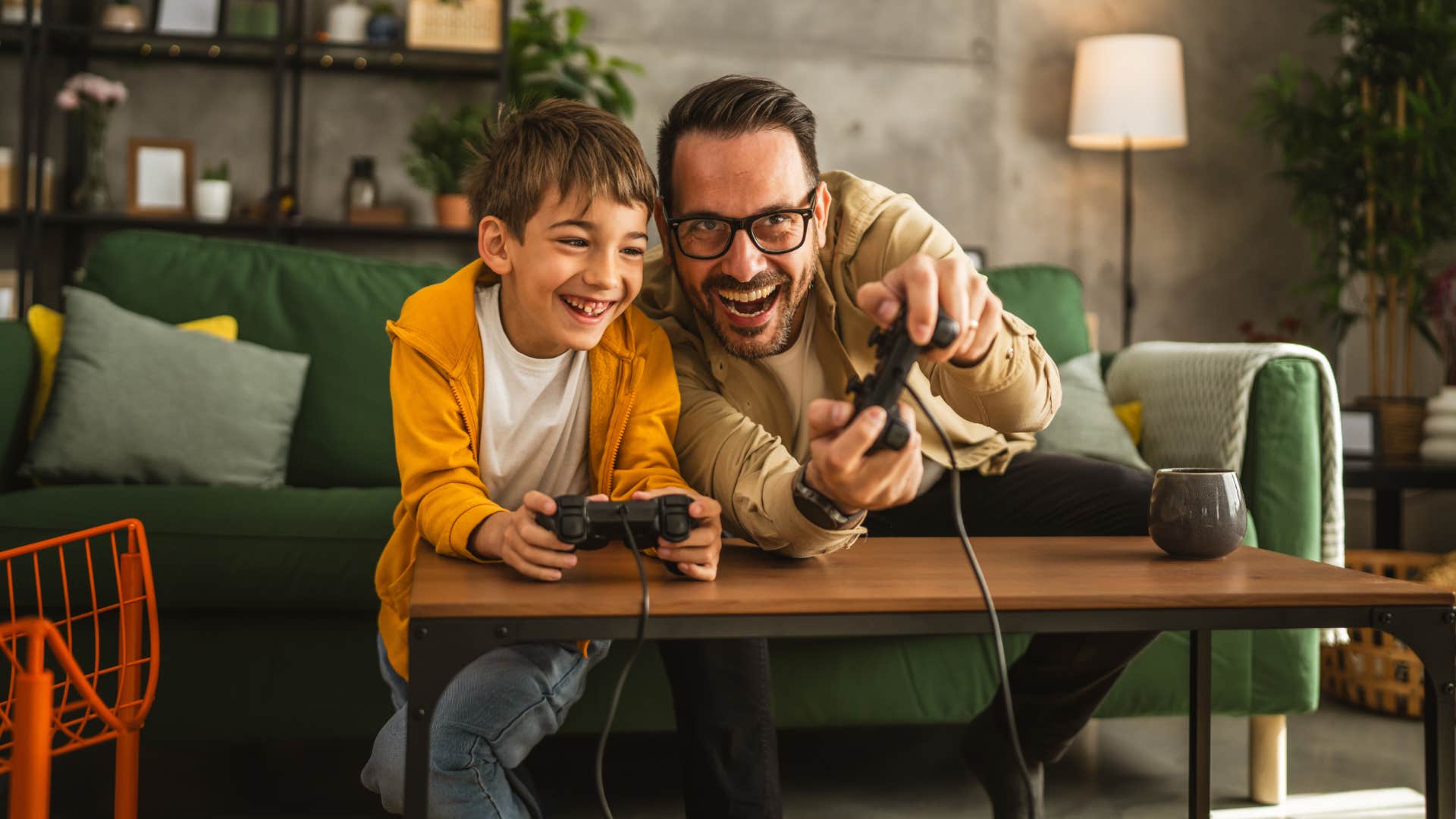dad playing video games with son instead of dealing with conflict