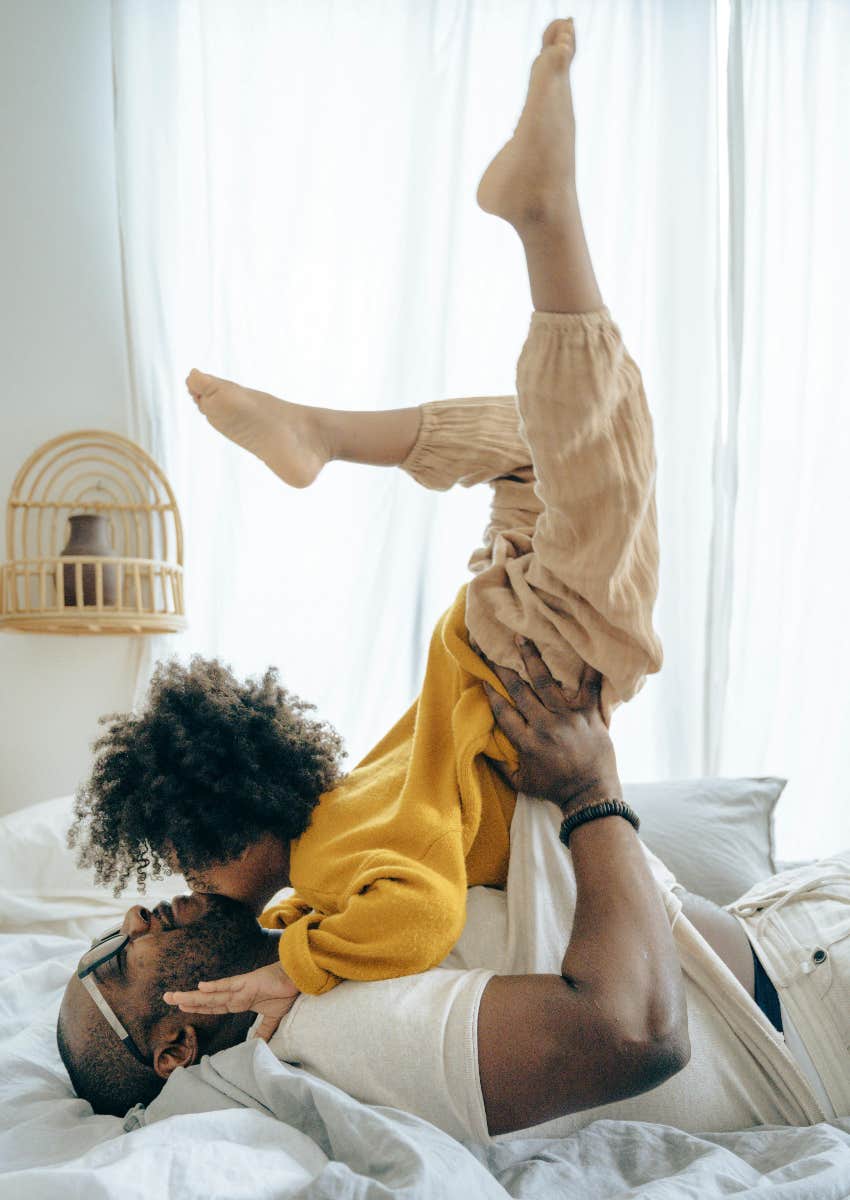 dad playing with his kid