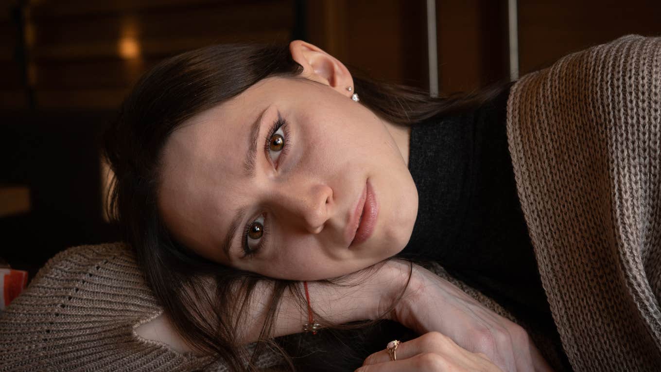 serious woman raised by gen z parents struggling