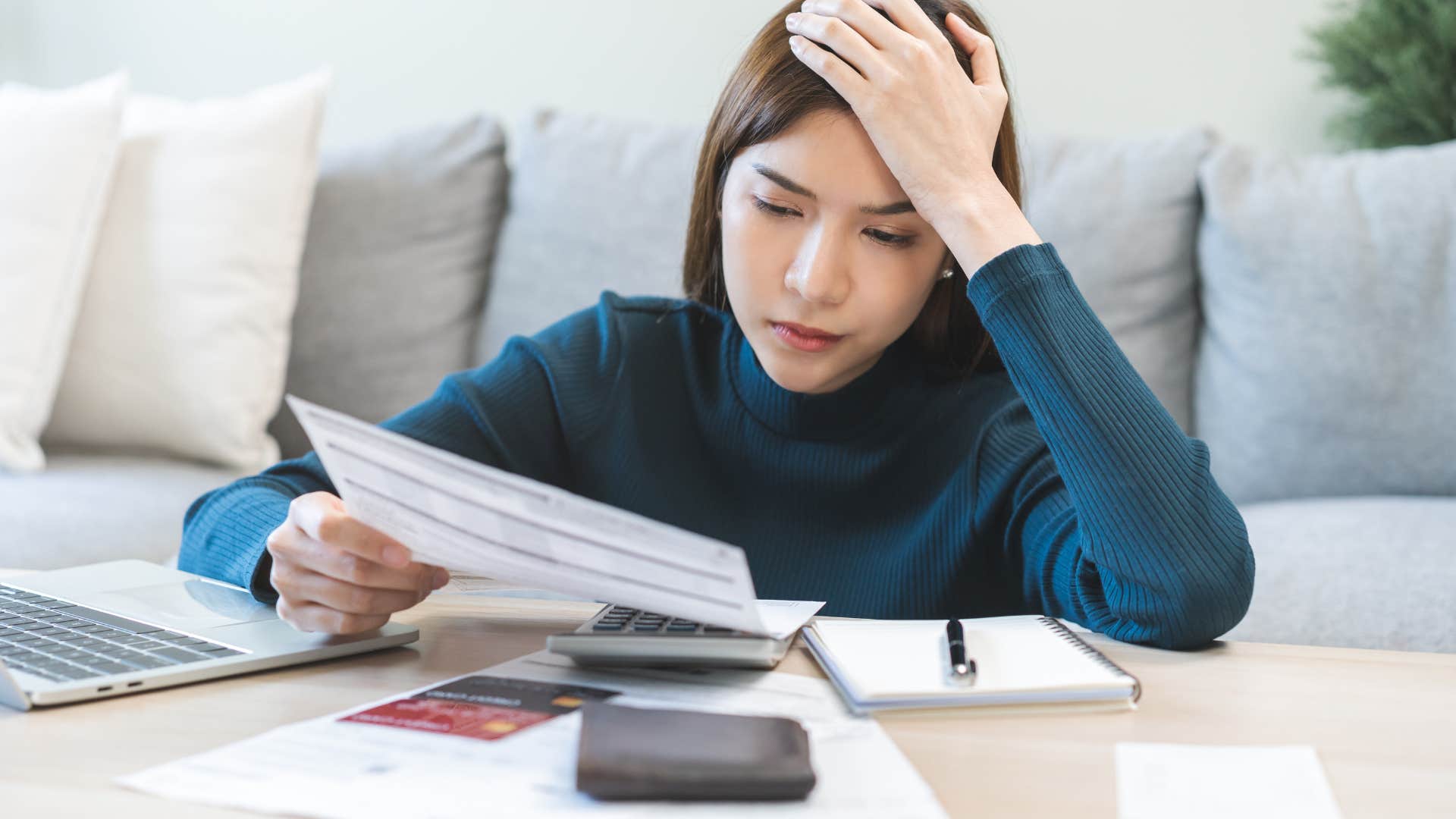 woman who is struggling with her finances