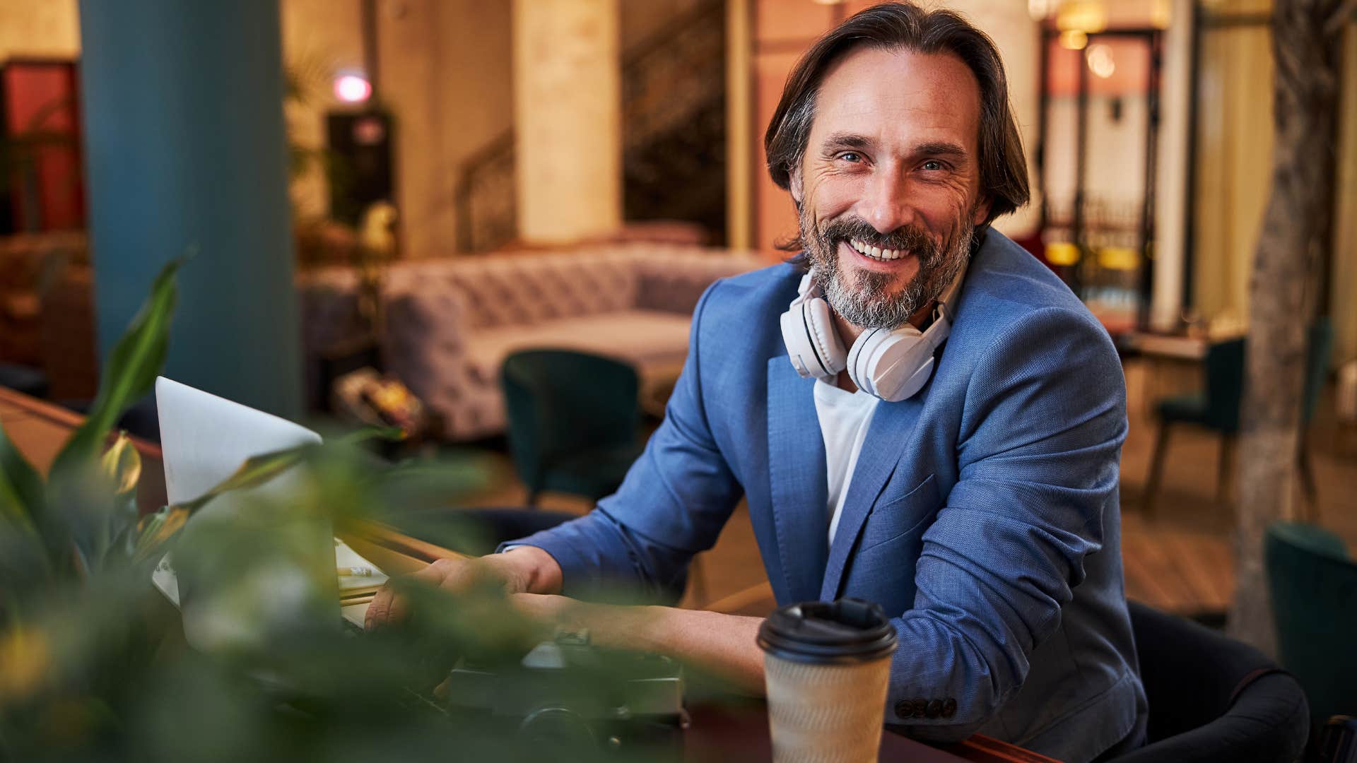 man who's low-maintenance working at home