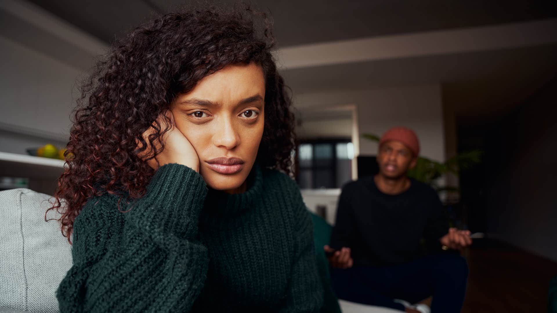 woman in green saying this isn't good enough as she ignores trying man