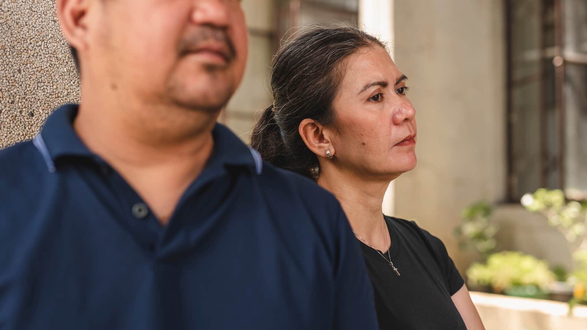 Woman saying "you never listen to me" to her husband.