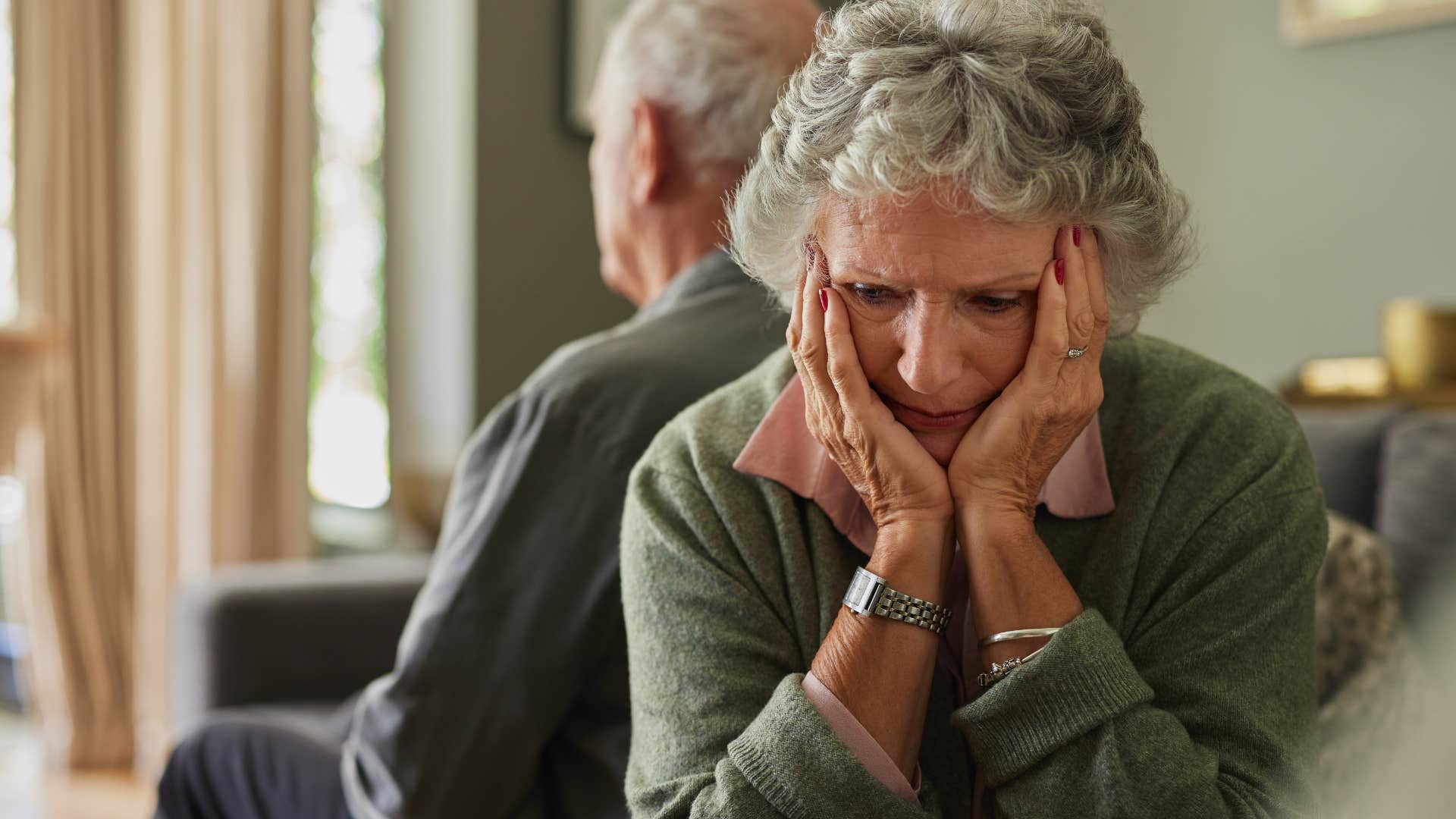 Upset woman saying "I feel like I'm the only one who cares" to her husband.