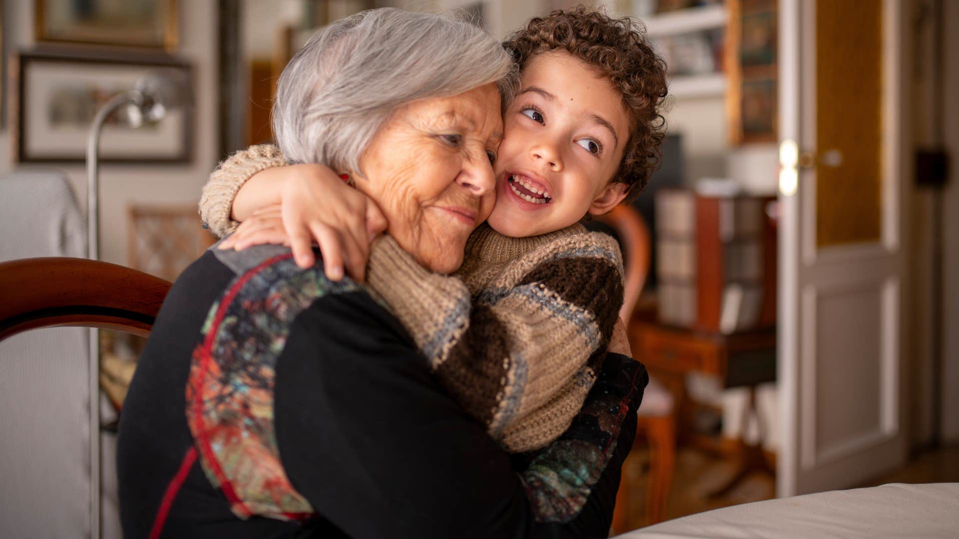 woman hugging her grandson