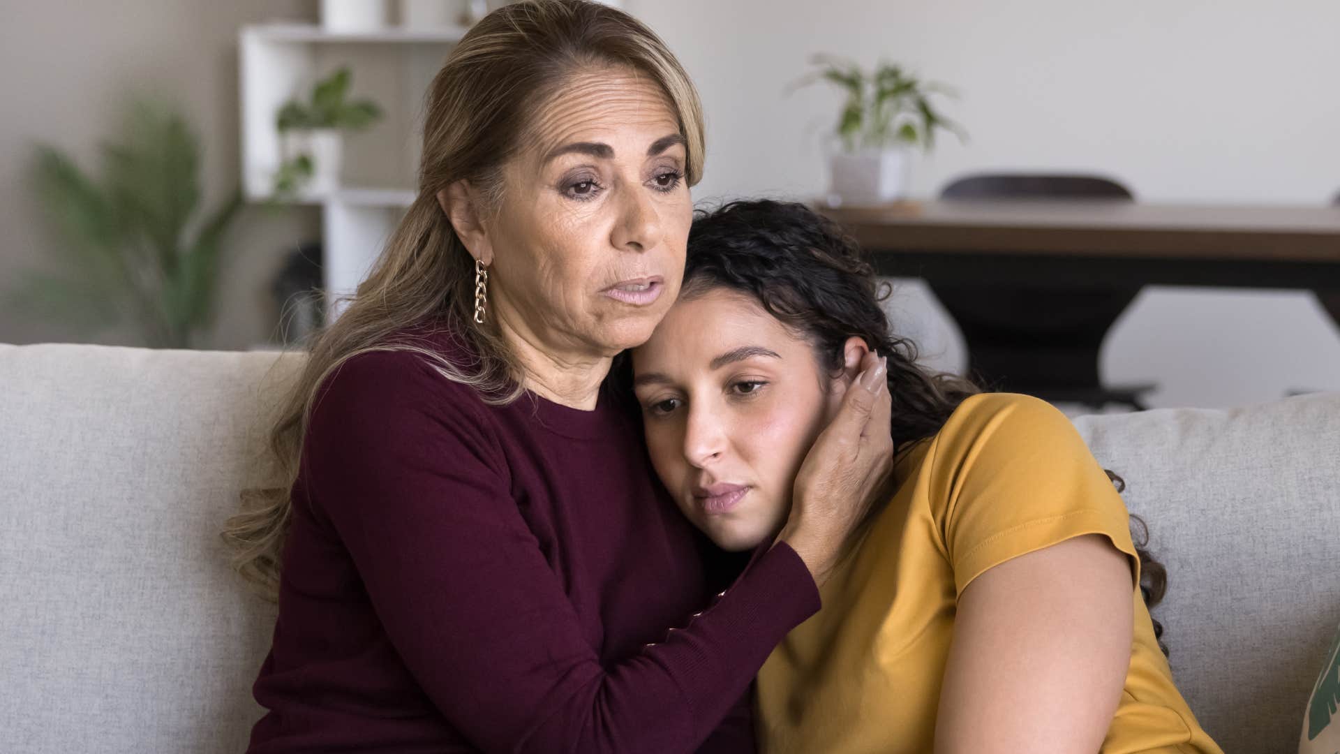 woman worrying about social media's effects on young daughter