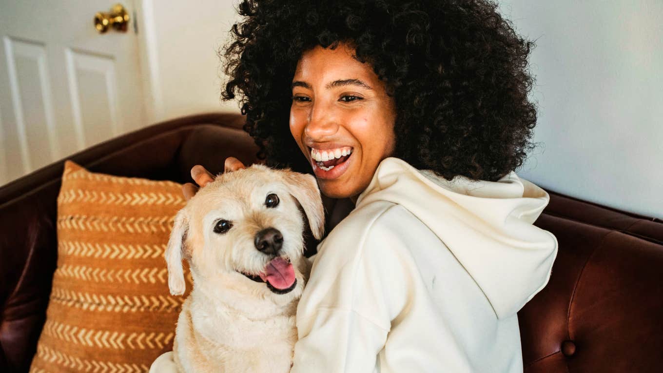 Woman with her special, enchanted pet. 